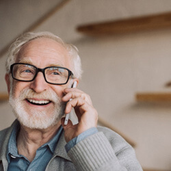 A senior talking on his cell phone